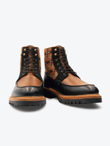 Front view of limited edition Brooklyn 1997 Symmetry Moc Boot. Handcrafted jacquard cloth with luxurious Italian suede, fullgrain black and cognac leather, lasted on our commando sole using the Goodyear method with storm welt